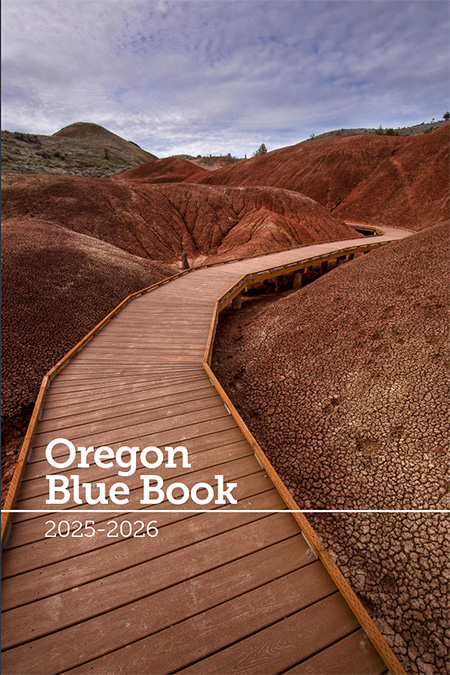 Cover of Oregon Blue shows a wooden walkway through the John Day Fossil Beds.